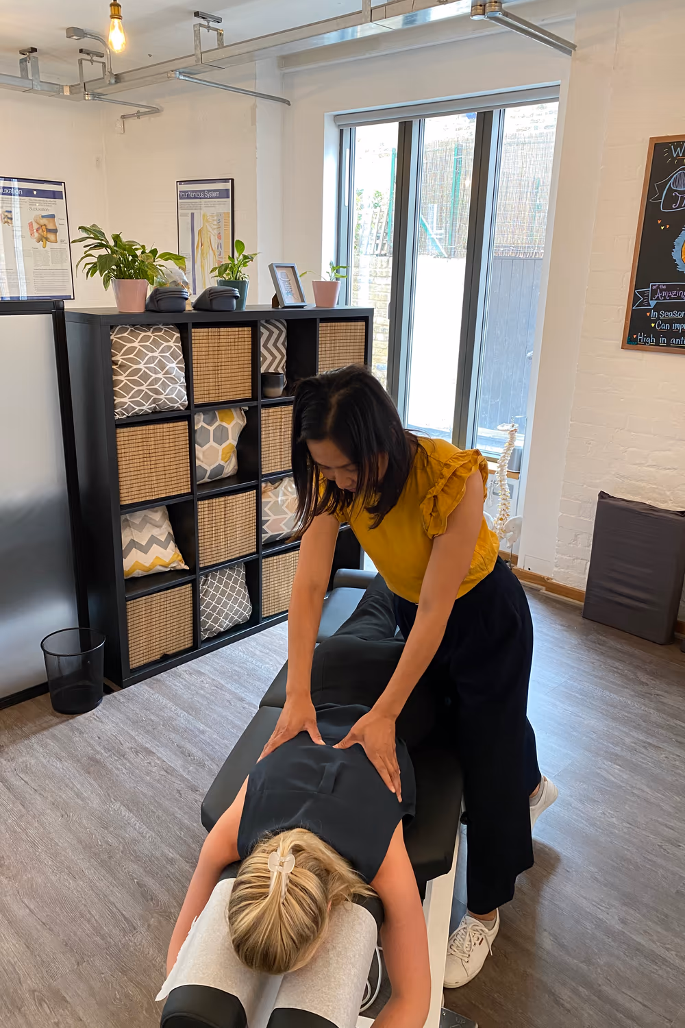 Chiropractor working on a patient’s back