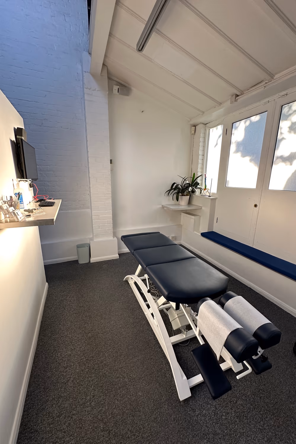 Bright treatment room at a Chiro London clinic